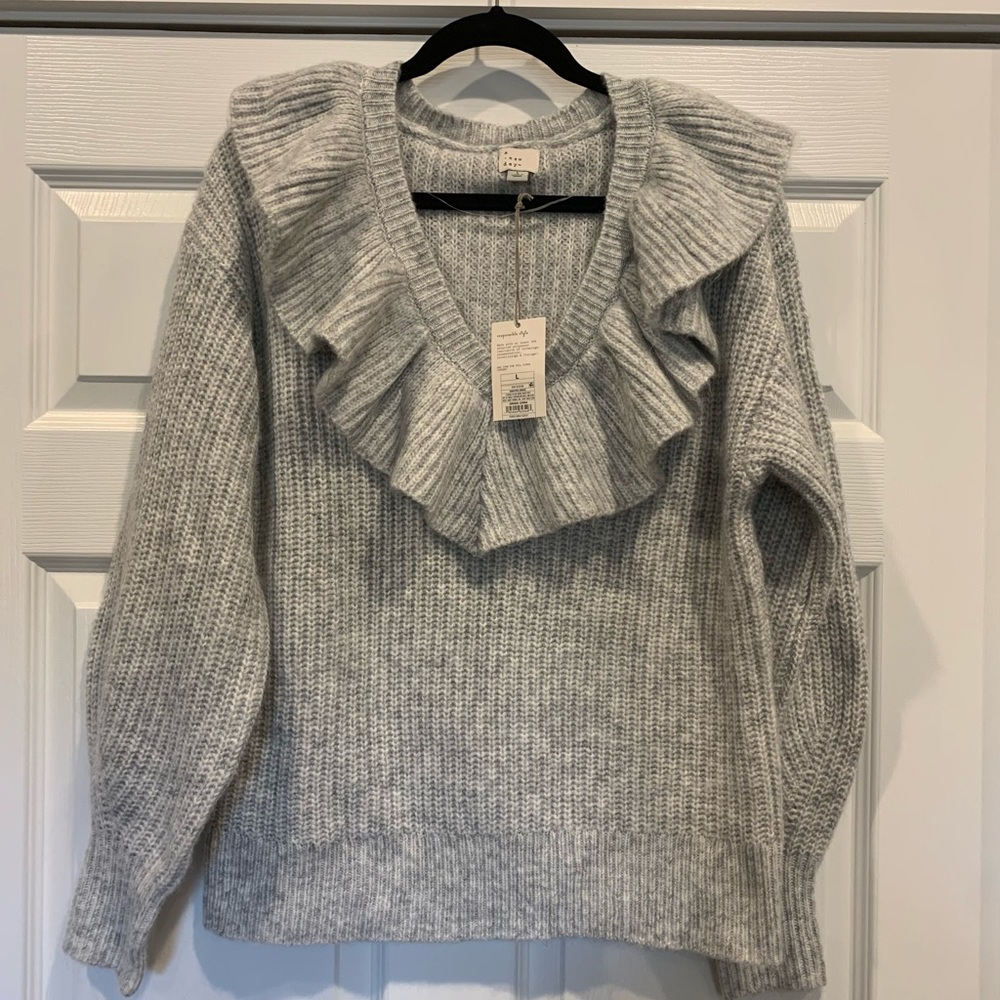 A new day sweater